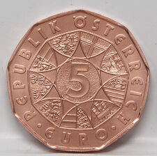 Die neuneckige Vorderseite der 5-Euro-Kupfermünze Österreich 2026, die kreisförmig angeordneten Wappenschilde der Bundesländer um den zentralen Nennwert 5.