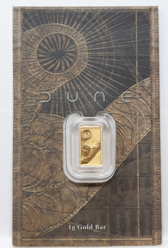 Vorderseite des 1g Dune Goldbarrens mit Sandwurm-Motiv in der Blisterkarte.