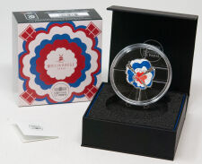 Die Vorderseite zeigt die rot colorierte Windmühle...