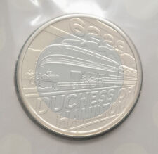 Rückseite der 2 Pfund Gedenkmünze 2026 Großbritannien mit der detailreichen Darstellung der stromlinienförmigen Dampflokomotive Duchess of Hamilton in Fahrt.